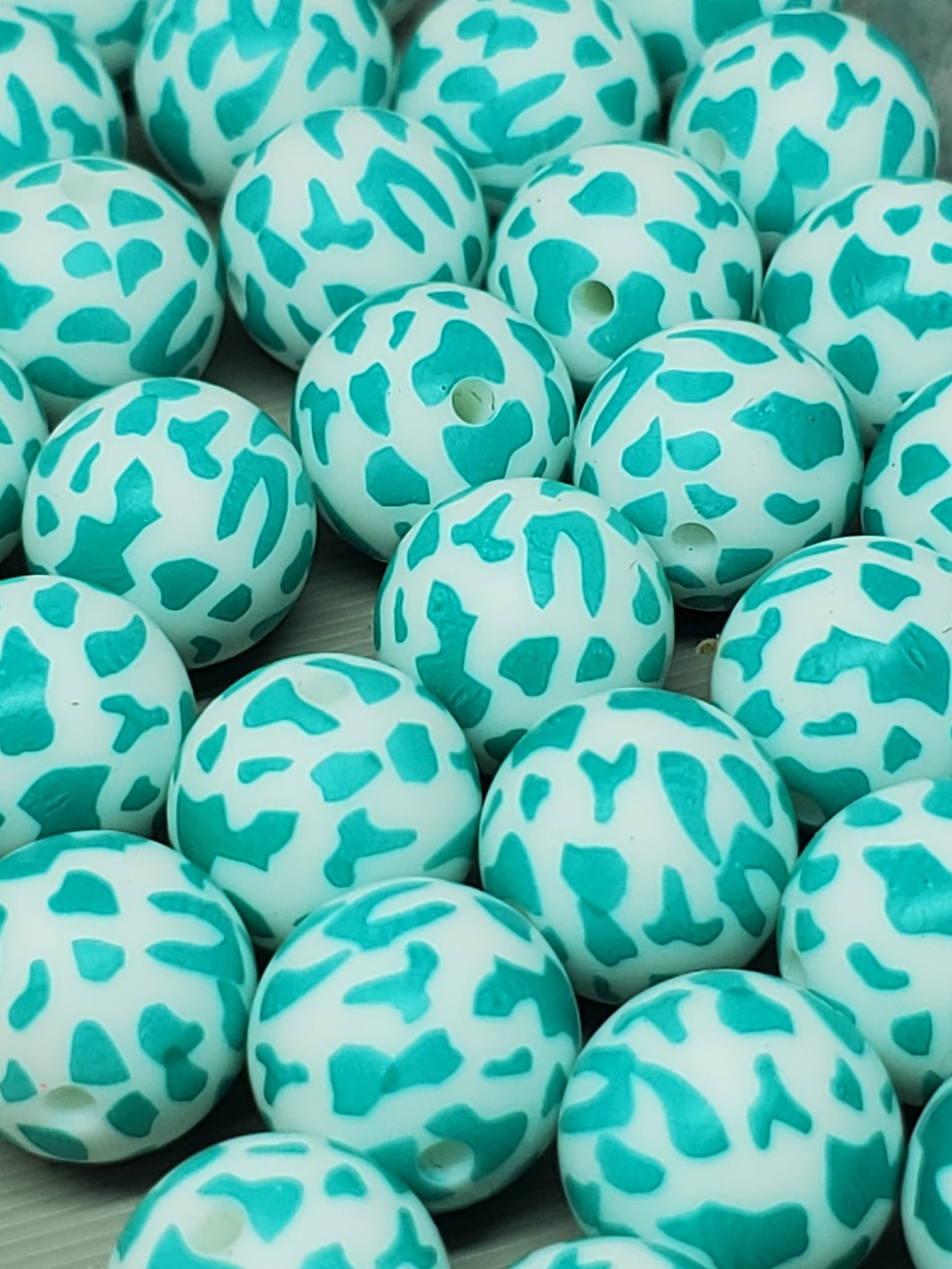 15 mm teal cowprint silicone beads-